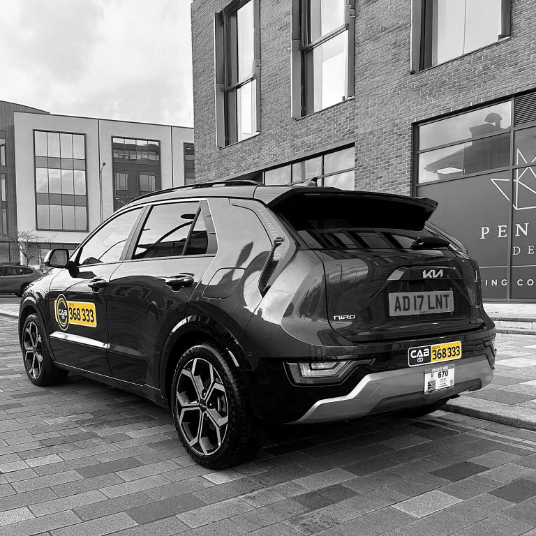 A image with a CabCo taxi used for long-distance taxi from Ashford
